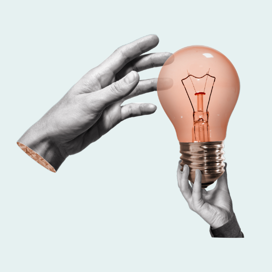 an upright hand presents a lightbulb. Another hand reaches out as if grasping an idea.